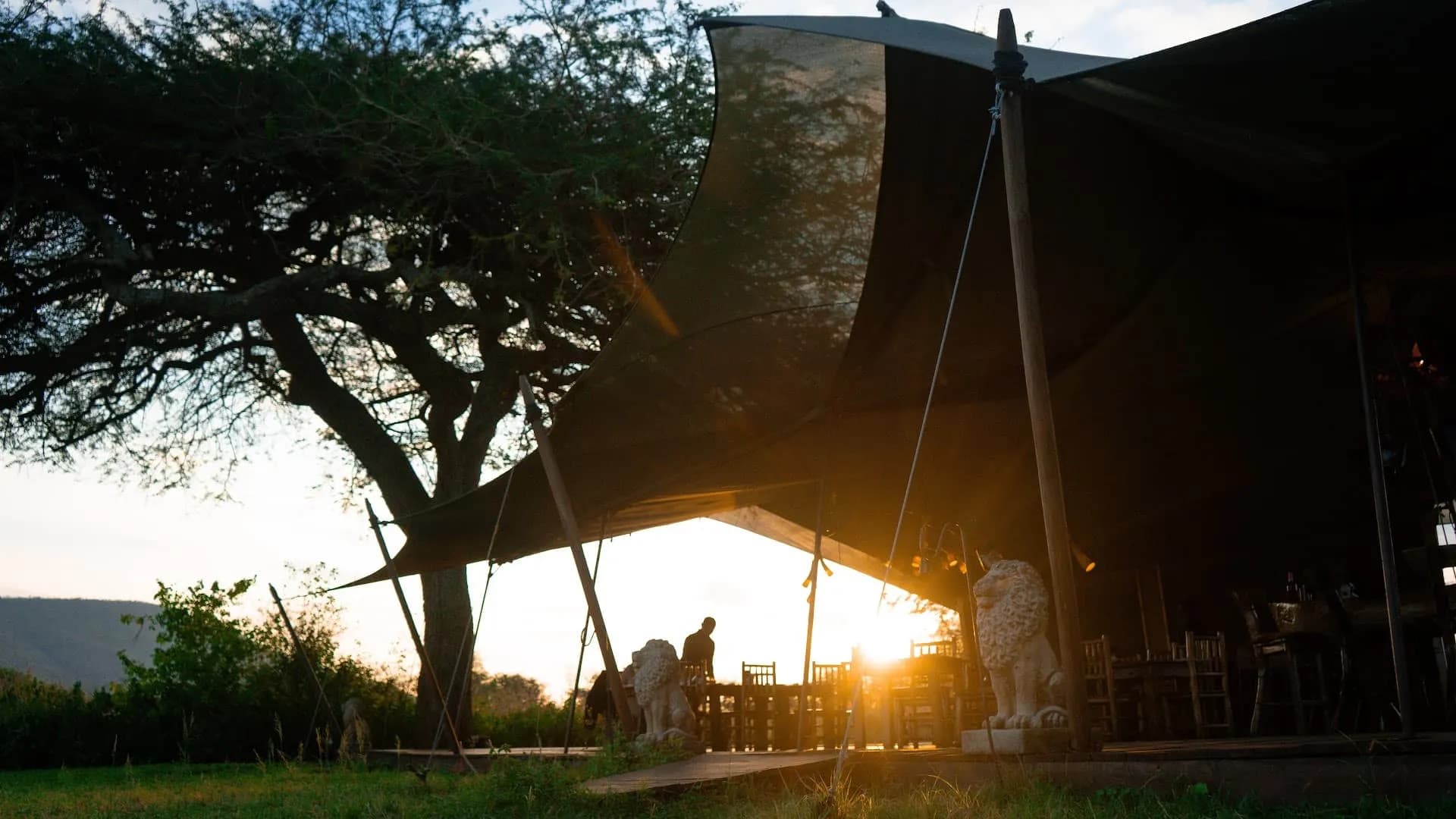Luxury tented camp in the Serengeti at golden hour